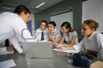 Work team around a meeting table