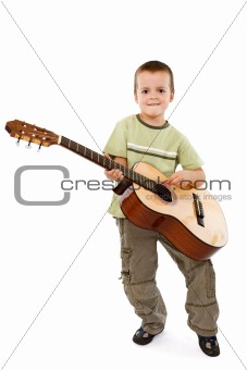 Little boy with acoustic guitar