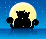 Two cats in moonlight
