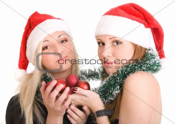 Two girls in Santa hats