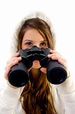 female holding binocular