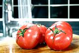 Tomatoes with running water