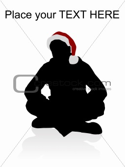 young male wearing red christmas hat and sitting on the floor