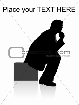 side pose of man sitting on briefcase