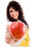 beautiful young woman holding red apple