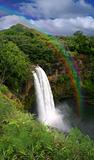 Waterfall in Kauai Hawaii With Rainbow