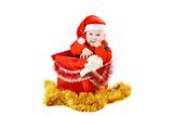 infant with gifts in the christmas box