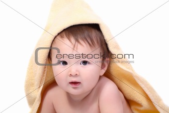 adorable baby wrapped in towel