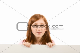 Blank sign - red head girl in glasses (with copy space)