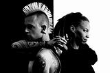 Man with Mohawk and Woman with Dreadlocks