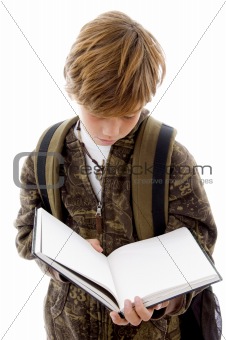 front view of school child reading 