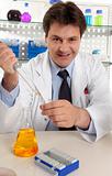 Scientist or chemist  at work in laboratory
