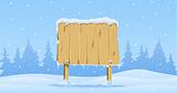 wooden blank board in snow