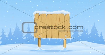 wooden blank board in snow