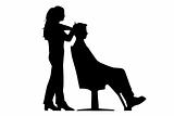 Woman cuttin a man's hair