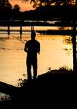 Fishing sunset silhouette
