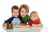 Smiley family eating pasta