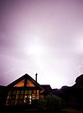 mountain cabin with raging thunderstorm