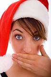 front view of woman with popped eyes wearing christmas hat