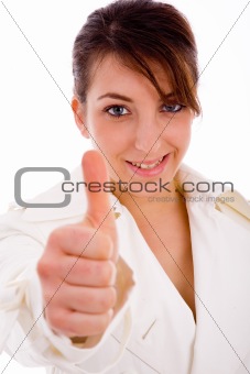 front view of smiling woman with thumbs up
