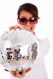 front view of happy woman holding disco ball