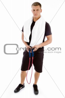 fitness man posing with stretching rope