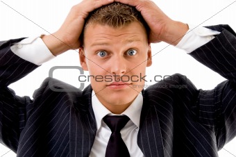 portrait of young executive holding his head