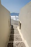Narrow street in town Oia, Santorini Greece