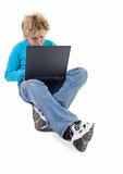 blonde boy working with laptop