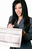 Businesswoman with newspaper