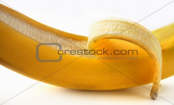 close-up half peeled banana 