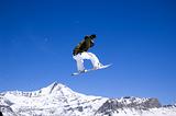 Snowboarder jumping high in the air