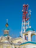 past and future - cellular tower and church
