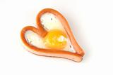 heart shape sausages with fried eggs