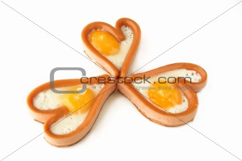 heart shape sausages with fried eggs