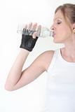 Woman drinking bottled water 