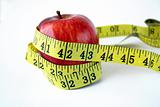 Apple with measuring tape 