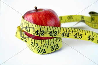 Apple with measuring tape 
