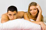 Young couple in the bed