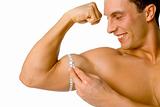 Man's mesuring his biceps