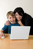 Adult and child enjoying computer time