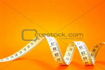 Measuring Tape on Orange