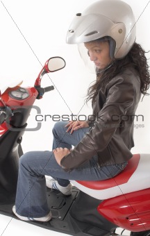 woman riding scooter