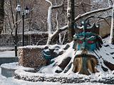 neptune fountain in winter town park
