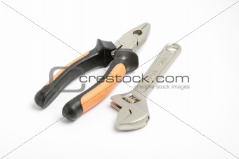 Combination pliers and wrench