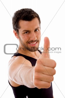 young male with thumbs up