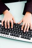 professional fingers working on keyboard