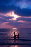 Children in Surf at Sunset