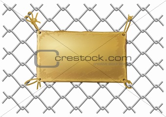 blank bronze metal plate on a wire net