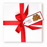 Pretty Wrapped Holiday Gift With Decorated Gift Tag
